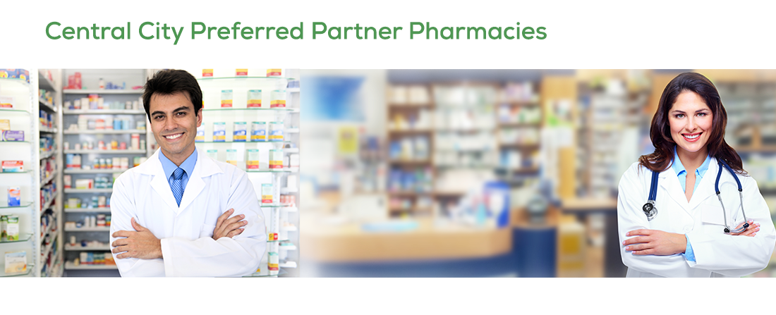 Image of a blurred out pharmacy in the background with a male and female doctor for CCCHC preferred partner pharmacy