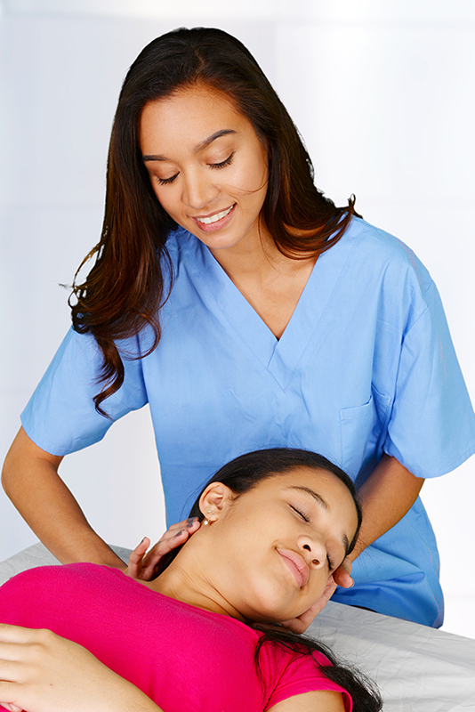 image of Female chiropractor to demonstrate chiropractic care at our Central City Community Health Centers