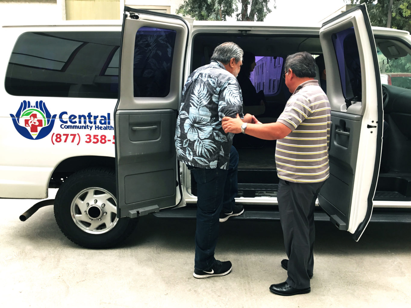 Central City Community Health Centers now has transportation at our clinics. Ask for information from your local CCCHC. One of our drivers giving a step up into our transport van and headed to a Central City Clinic